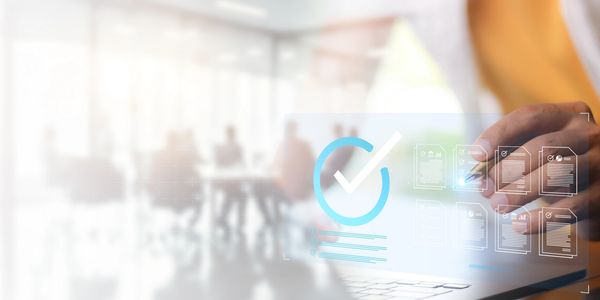 Person interacting with a digital checklist and documents on a futuristic transparent screen.