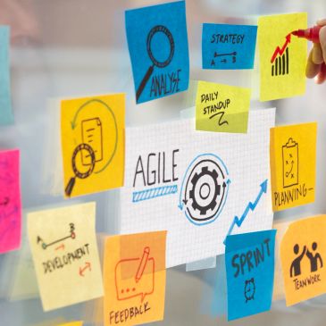 Agile development concepts on sticky notes.