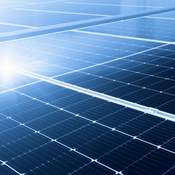 Close-up of solar panels capturing sunlight for renewable energy.