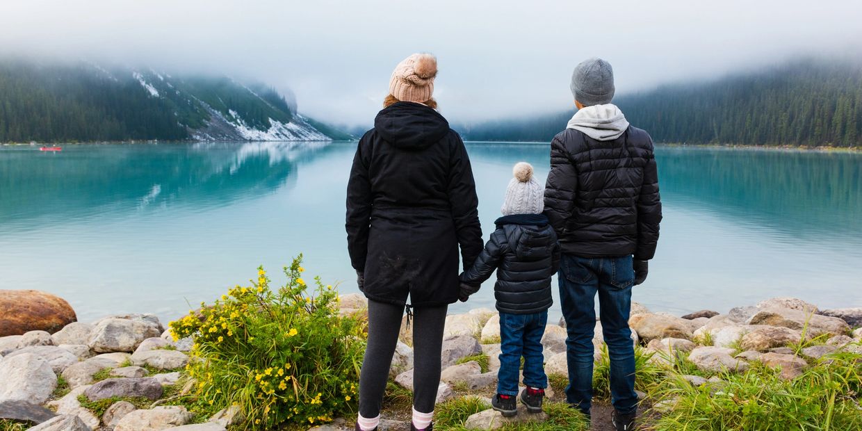 A potential family therapy client looking out onto a scenic view.