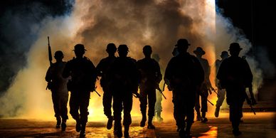 Preppers walking away from a smoky area