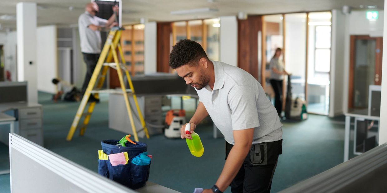 Janitors cleaning an office space in Baltimore.