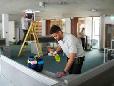 Workers cleaning an office space