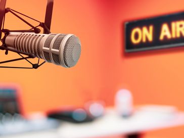 Close-up of a microphone in a radio studio.