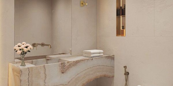 Elegant bathroom with marble sink and minimalist design.