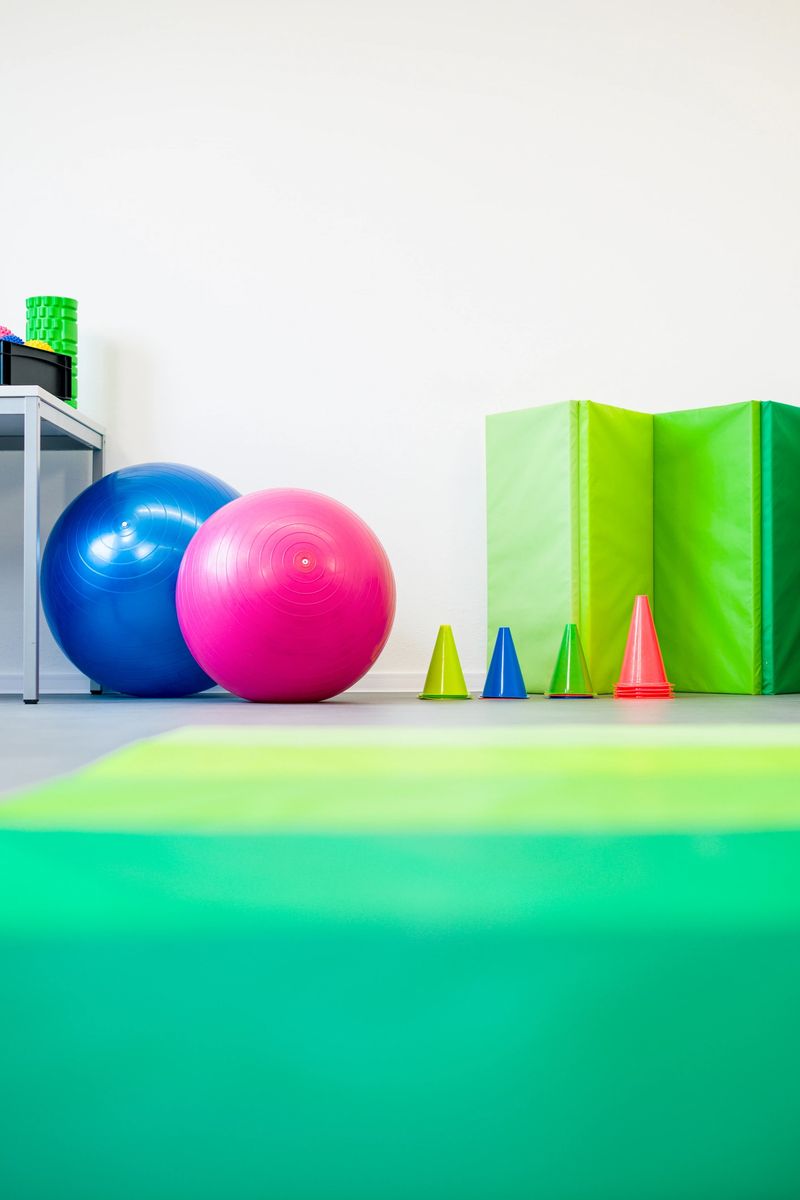 Colourful equipment used in child physical therapy sessions. Physiotherapy room filled with tools.