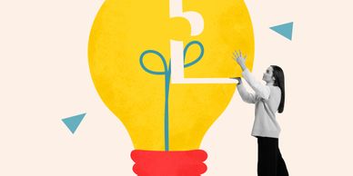 Woman fitting a puzzle piece into a giant light bulb illustration.