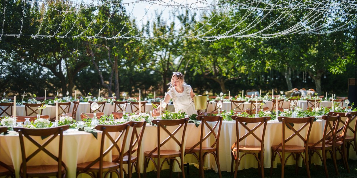 Corporate event planner in nashville tn putting the finishing touches on an outdoor corporate event