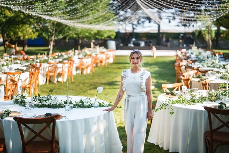Moments of the team working on floral decorations for a wedding event.