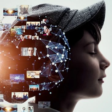 Profile of a person with digital network and multimedia images overlay.