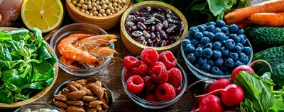 Bowls of various, brightly colord foods.