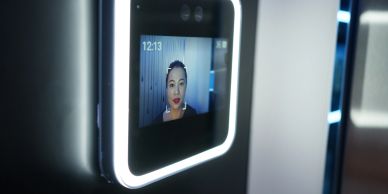 Face recognition screen shows a woman's face.