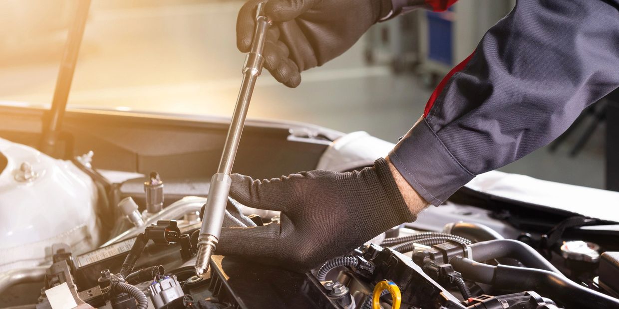 Mechanic working on a car