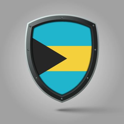 Shield with the flag of the Bahamas on a gray background.