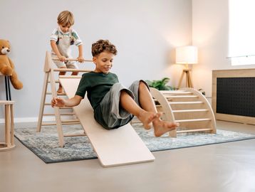 Wooden play gym for toddlers.