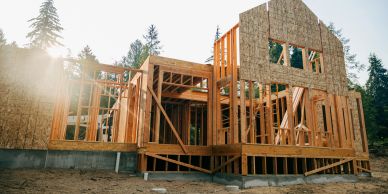 Wooden frame of a house under construction.