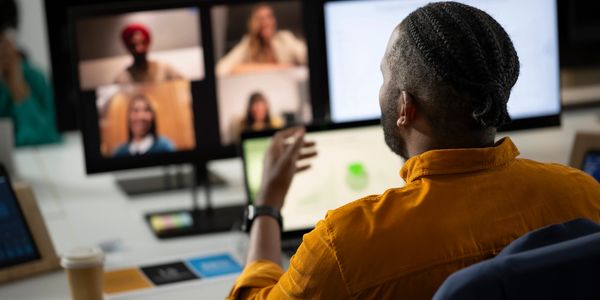 Founder meeting with an international team by video call