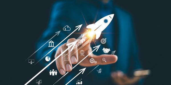 Startup growth concept with digital rocket and business technology icons