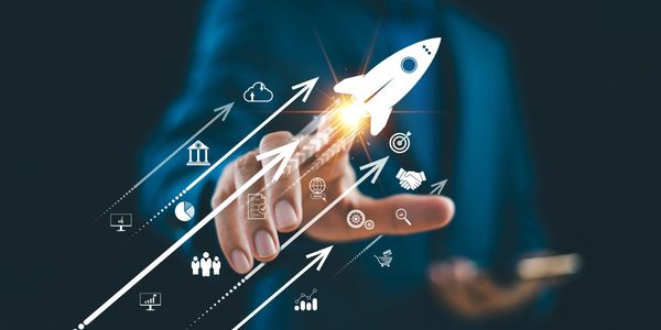 Startup growth concept with digital rocket and business technology icons