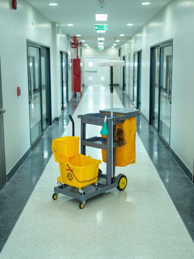 Cleaning cart in an office hallway as part of our commercial cleaning service in Liverpool