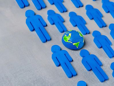 people figures with a globe in the middle