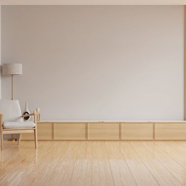 Minimalist living room with wooden accents, plants, and soft lighting.