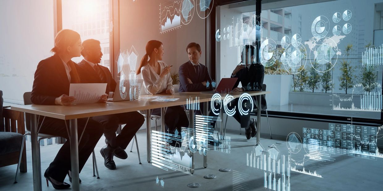 Business team discussing data analytics in a modern office.