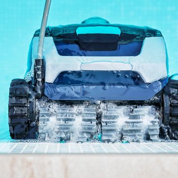 robotic pool cleaner in pool