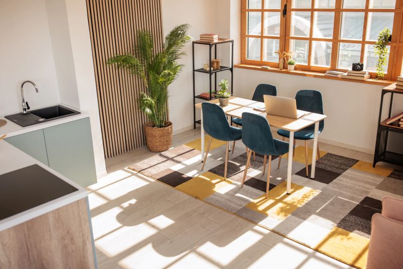 Shot of a Bright Cozy modern  Apartment with Big Windows, Decorations and Stylish Furniture