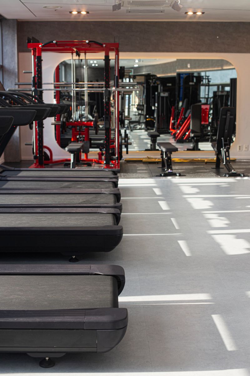 Gym Room Fitness Center With Equipment And Machines