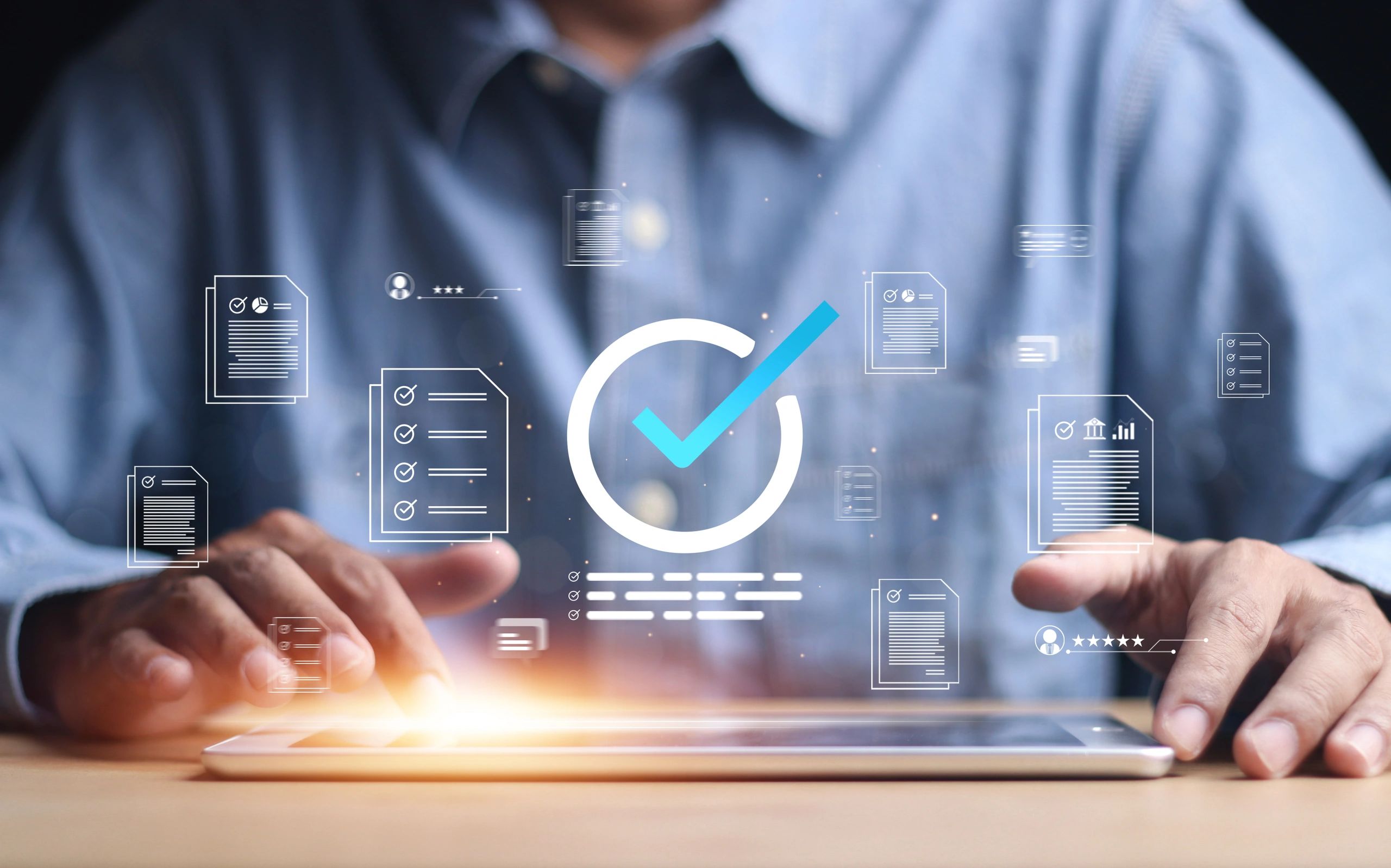 Person interacting with a tablet displaying digital checklists and documents with a large blue checkmark.