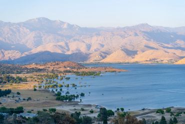 Lake with mountains in the background.