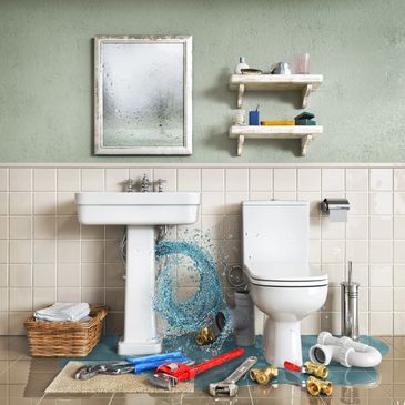 Bathroom with a leaking sink and plumbing tools scattered on the floor.