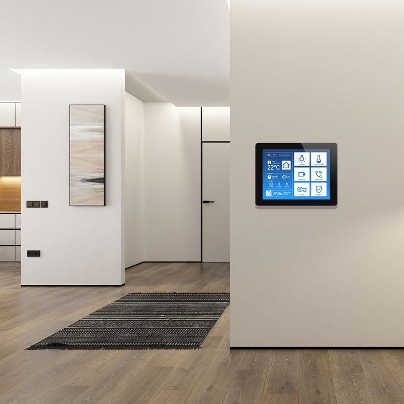 Contemporary interior showcasing a sleek white design, featuring a high-tech control panel on the wall. This smart home automation system allows for seamless management of various home functions including heating, lighting, doors, windows, security, communication, and internet connectivity. Ideal for illustrating the concept of integrated home automation and modern living. Perfect for use in promotional materials, technology articles, and real estate presentations to highlight advanced home technology and stylish interior design. Control panel show C Celsius temperature. 3d