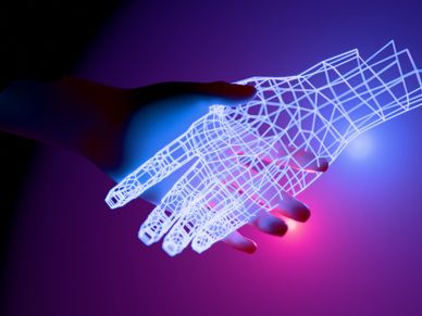 Human hand reaching toward a wireframe digital hand.