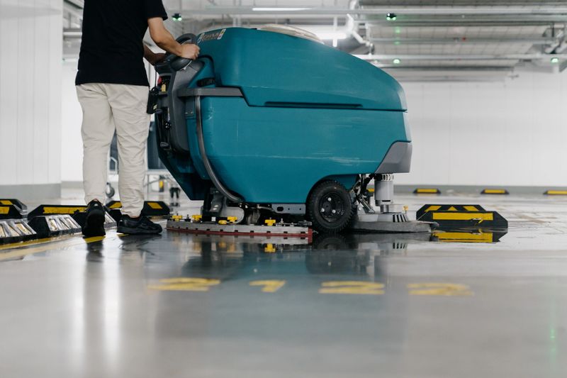 Cleaners are cleaning the parking lot