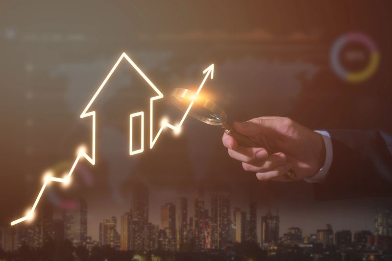 Concept of business prosperity and asset management, Real estate investment marketing analysis, Man holding magnifying glass looking for opportunity in invest, Planning to increase profits