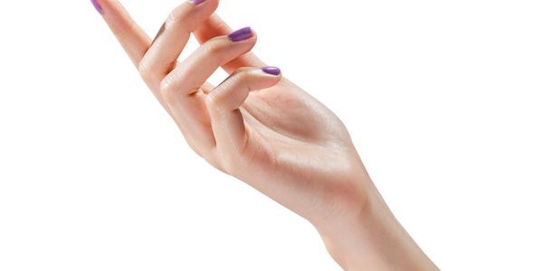 Elegant hand with purple nail polish on a white background.