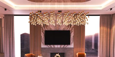 Modern living room with elegant lighting and cozy seating.