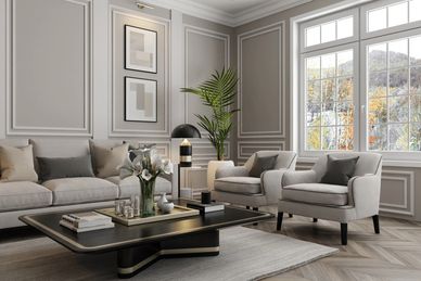 Elegant living room with neutral tones, modern furniture, and large windows.