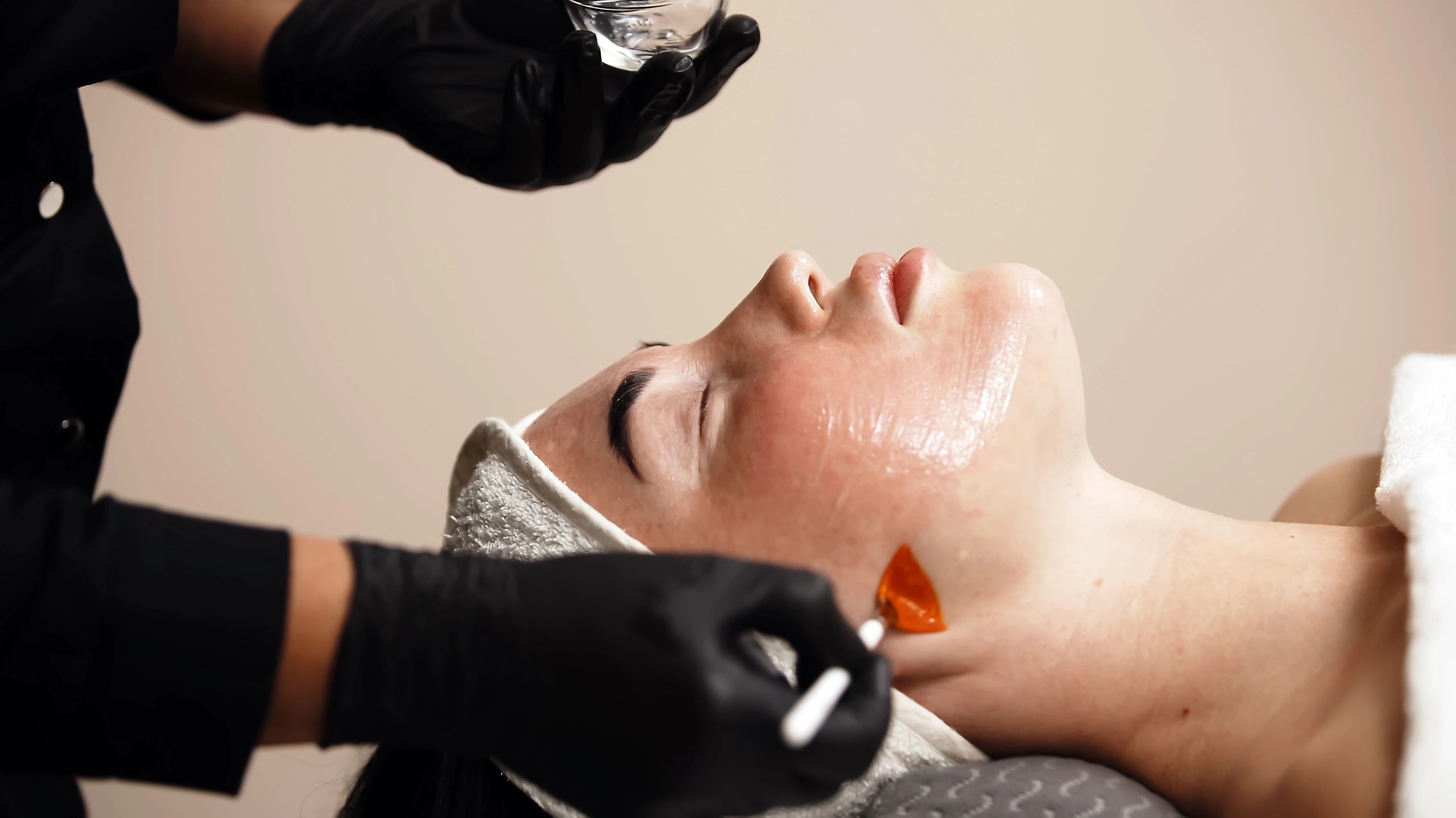 Clean, professional medical spa treatment room with neutral tones at Seven Layer Skin in Providence