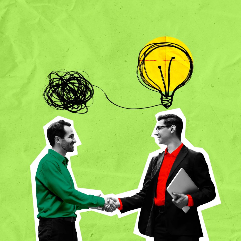 Two men shaking hands connecting a chaotic thought to a bright idea.