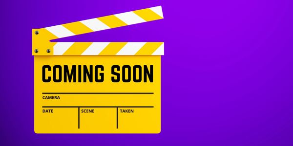 Yellow film clapperboard with 'COMING SOON' text on a purple background.
