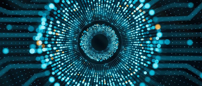 Digital circular pattern with glowing blue and orange dots representing data or technology.