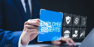 Businessman selecting employee benefits on a digital interface.