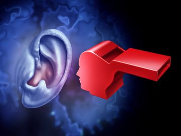 Red whistle shaped like a head facing a large blue ear.