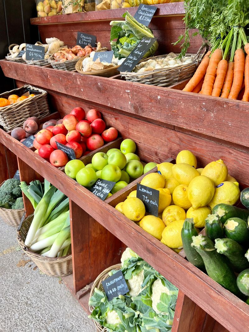 Selection of fruit and vegetables on display at a farmers market