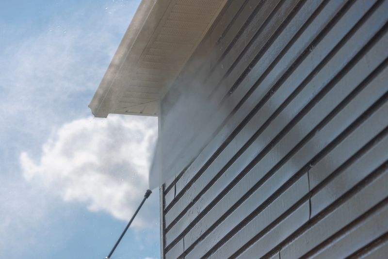 Pressure Washing Vinyl Siding - House