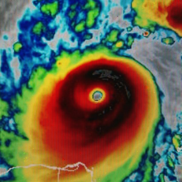 Satellite image showing a powerful hurricane with a defined eye.