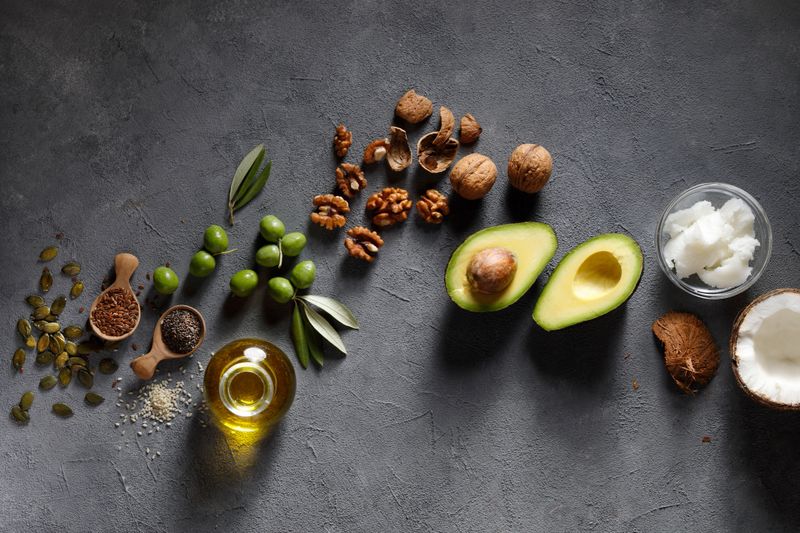 Different vegan fats with fruits, nuts and seeds